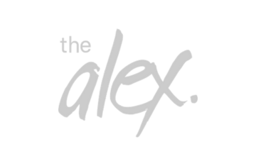 Logo of The Alex, featuring the word 'the' in small, lowercase letters, and 'alex' in larger, stylized, cursive-like font.