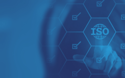 ISO certification concept with a digital interface, checkmarks, and a person selecting the ISO logo on a blue background. Represents quality standards like ISO 9001 and ISO 13485 in electronics manufacturing.